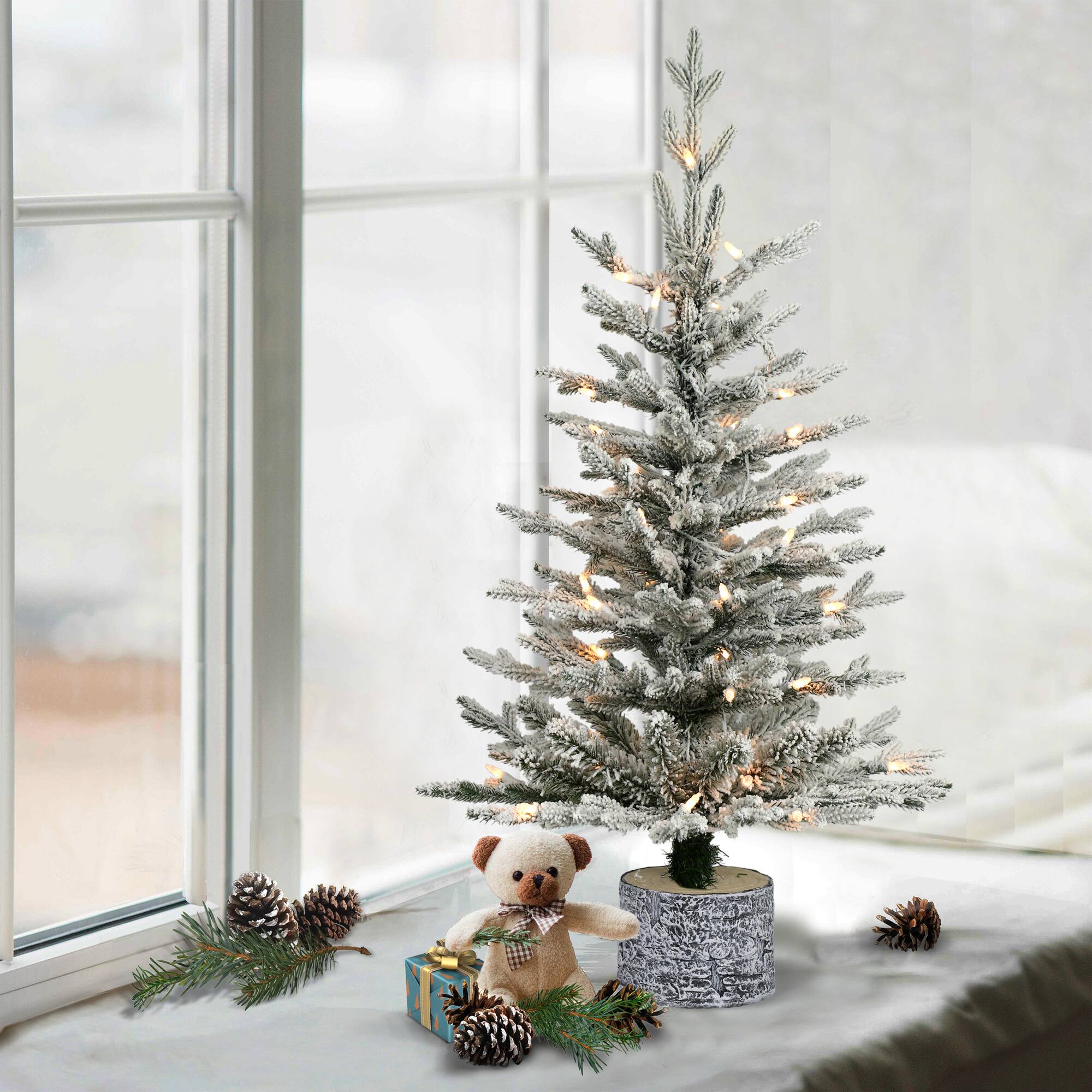 6 Pack: 3ft. Pre-Lit Flocked Arctic Fir Tree in Stump Planter, Warm White LED Lights